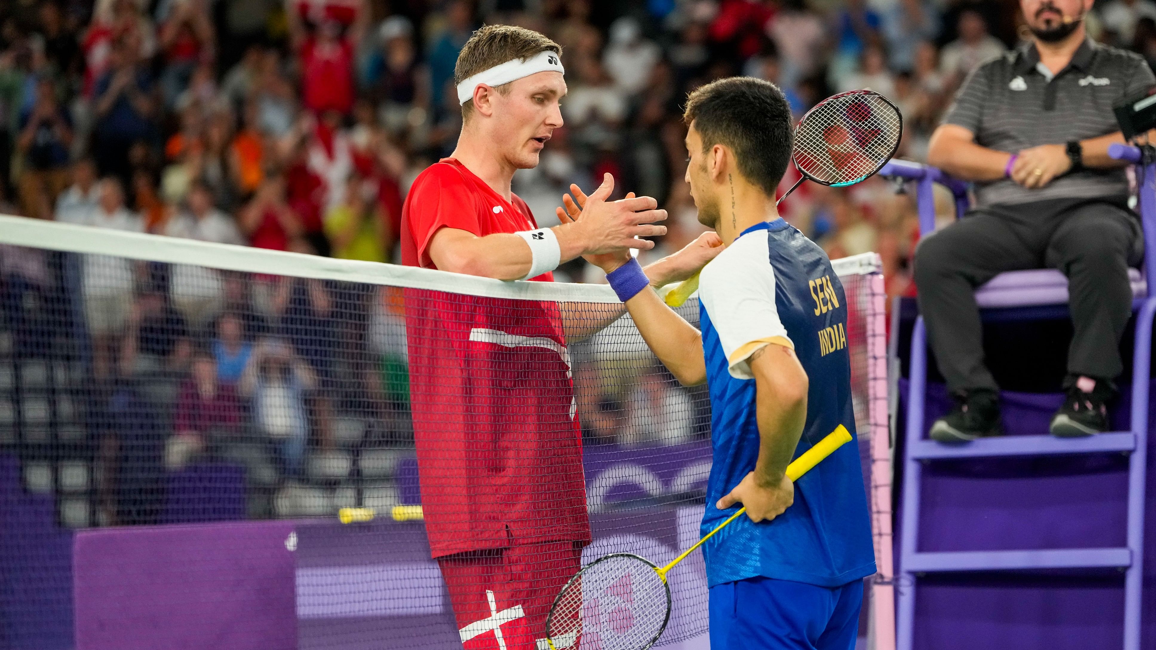 <div class="paragraphs"><p>India’s Lakshya Sen congratulates Denmark’s Viktor Axelsen for winning the Men’s Singles Semifinal badminton match at the 2024 Summer Olympics, in Paris, France, Sunday, Aug. 4, 2024.</p></div>